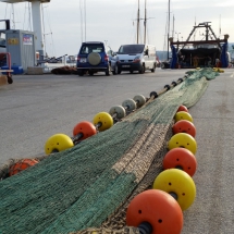 Red pesquera en el puerto de Palamós